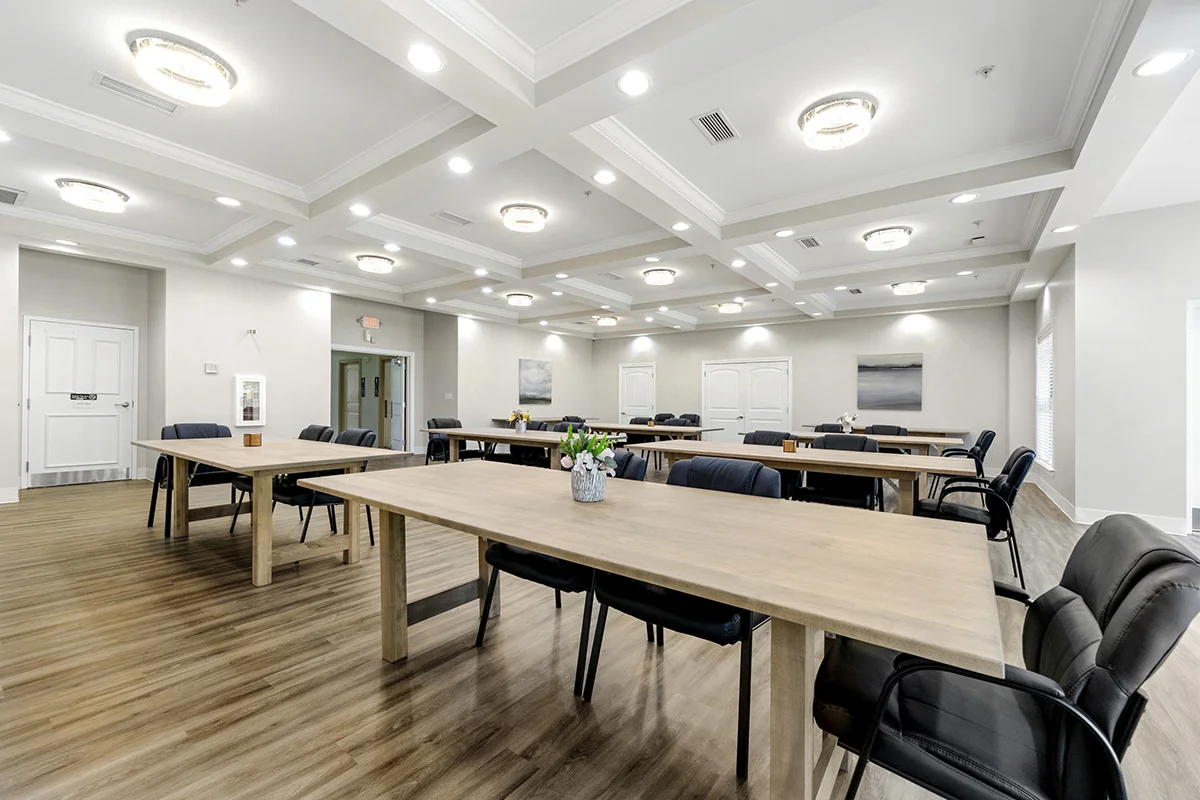 a room with tables and chairs